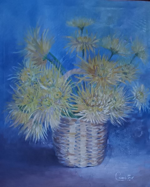 Una cesta con flores pintadas al óleo